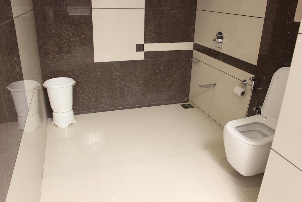 Hotel Magnum Inn Junagadh Rom bilde