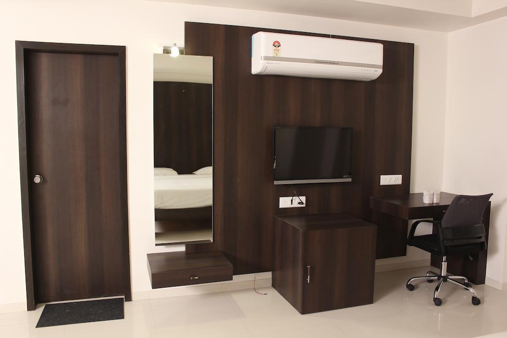 Hotel Magnum Inn Junagadh Rom bilde